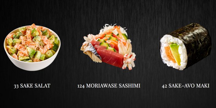 3Sake Salat, Moriawase Sashimi und Sake-Avo Maki auf Schieferplatte angerichtet.